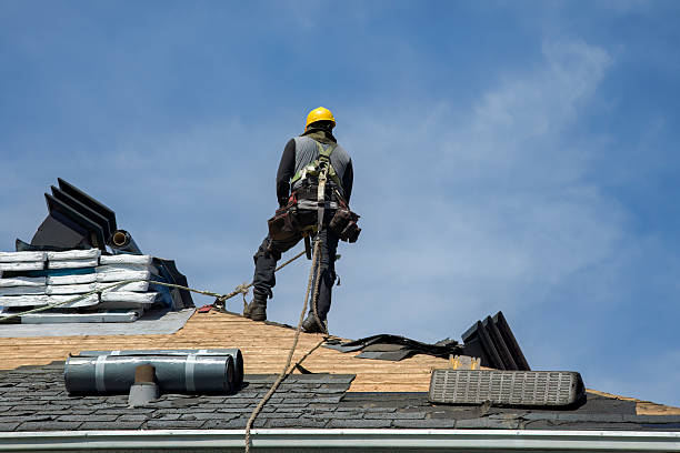 Professional Gutter Installation technician working in West Medford, MA
